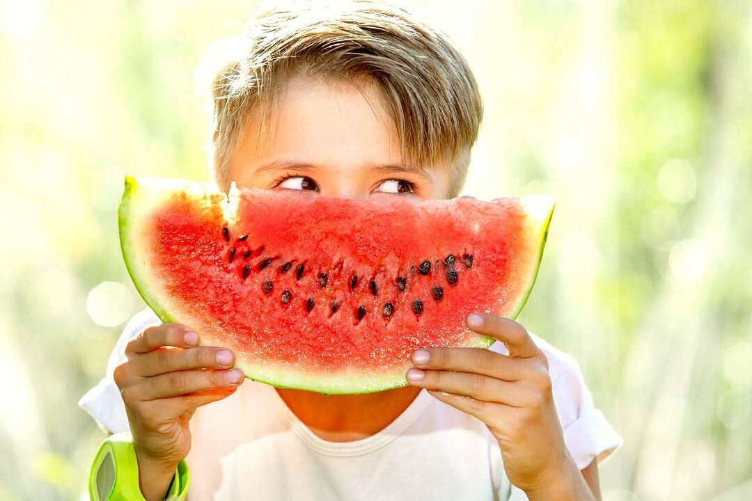 the child eats watermelon